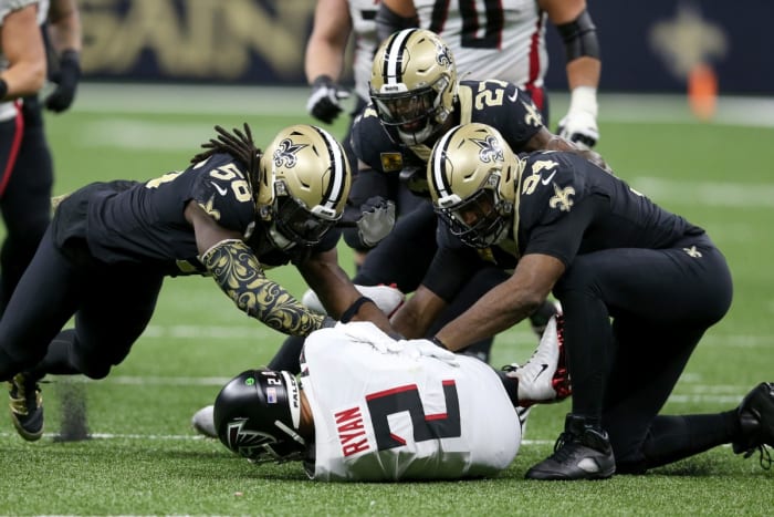 Atlanta quarterback Matt Ryan (2) is sacked by linebacker Demario Davis (56), safety Malcolm Jenkins (27) and end Cameron Jordan (94). Mandatory Credit: Chuck Cook-USA TODAY